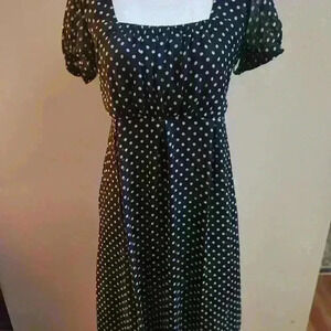 Verona polyester, lined, black with white polka dot dress. Hidden zipper